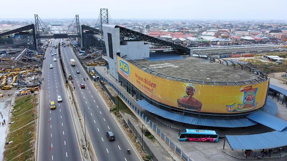Aerial view of the expressway beside the National Stadium in Surulere with a blue BRT bus